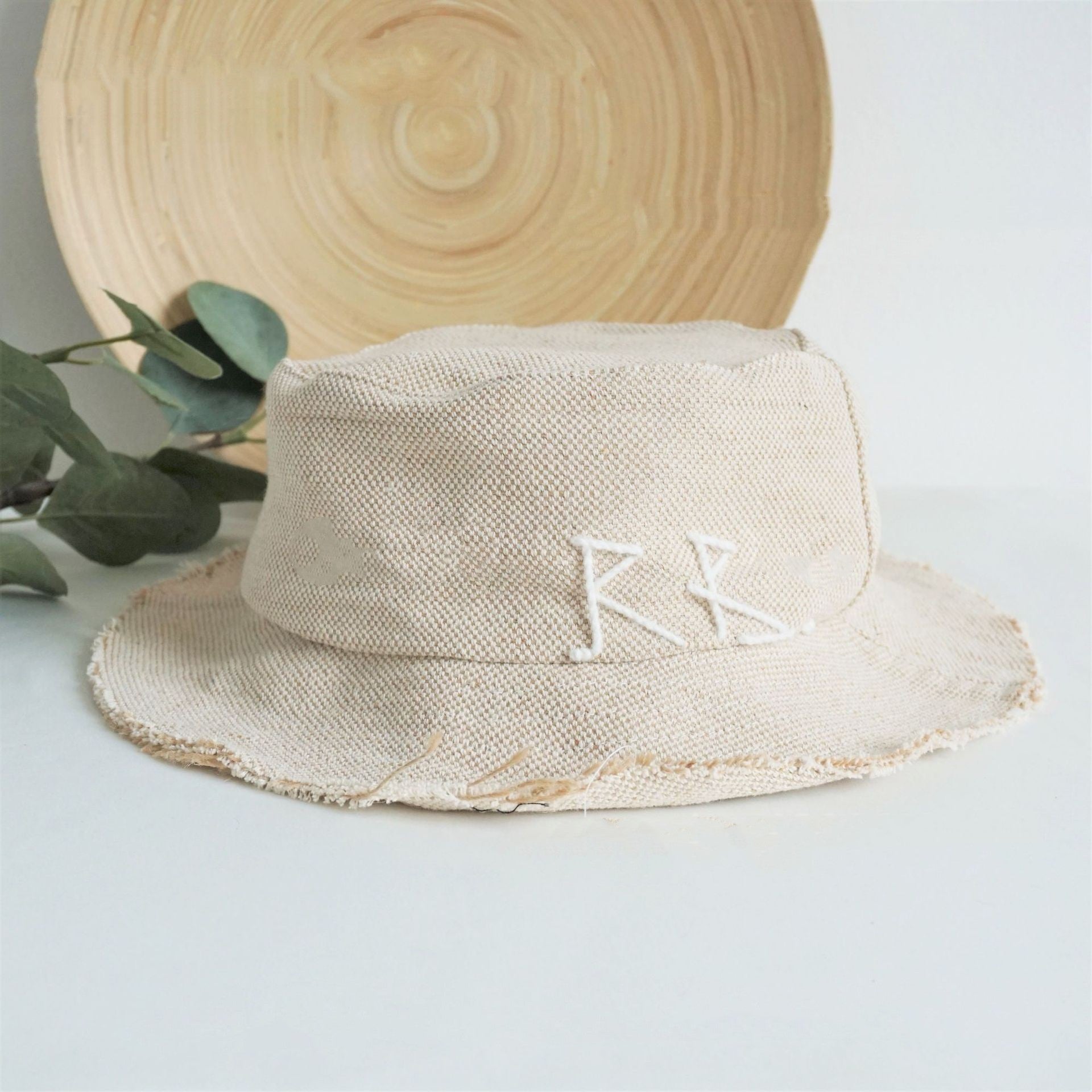 Simple And Stylish Bucket Hat With A Relaxed Lettered Design