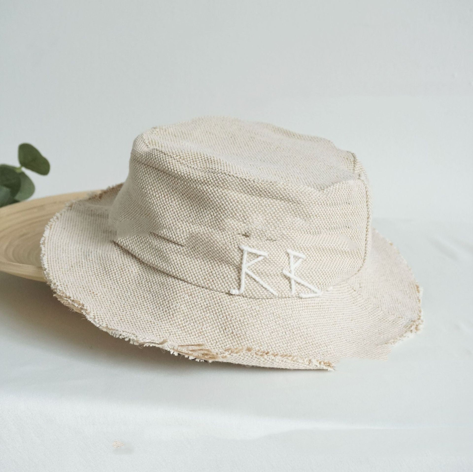 Simple And Stylish Bucket Hat With A Relaxed Lettered Design